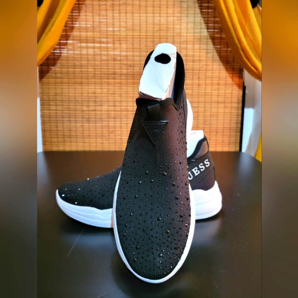 Black and white guess sneakers with little black diamonds